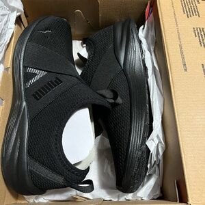 PUMA woman’s Black Athletic Slip-Ons